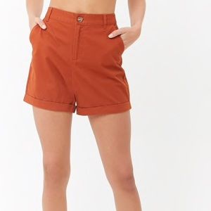 Orange high waisted shorts